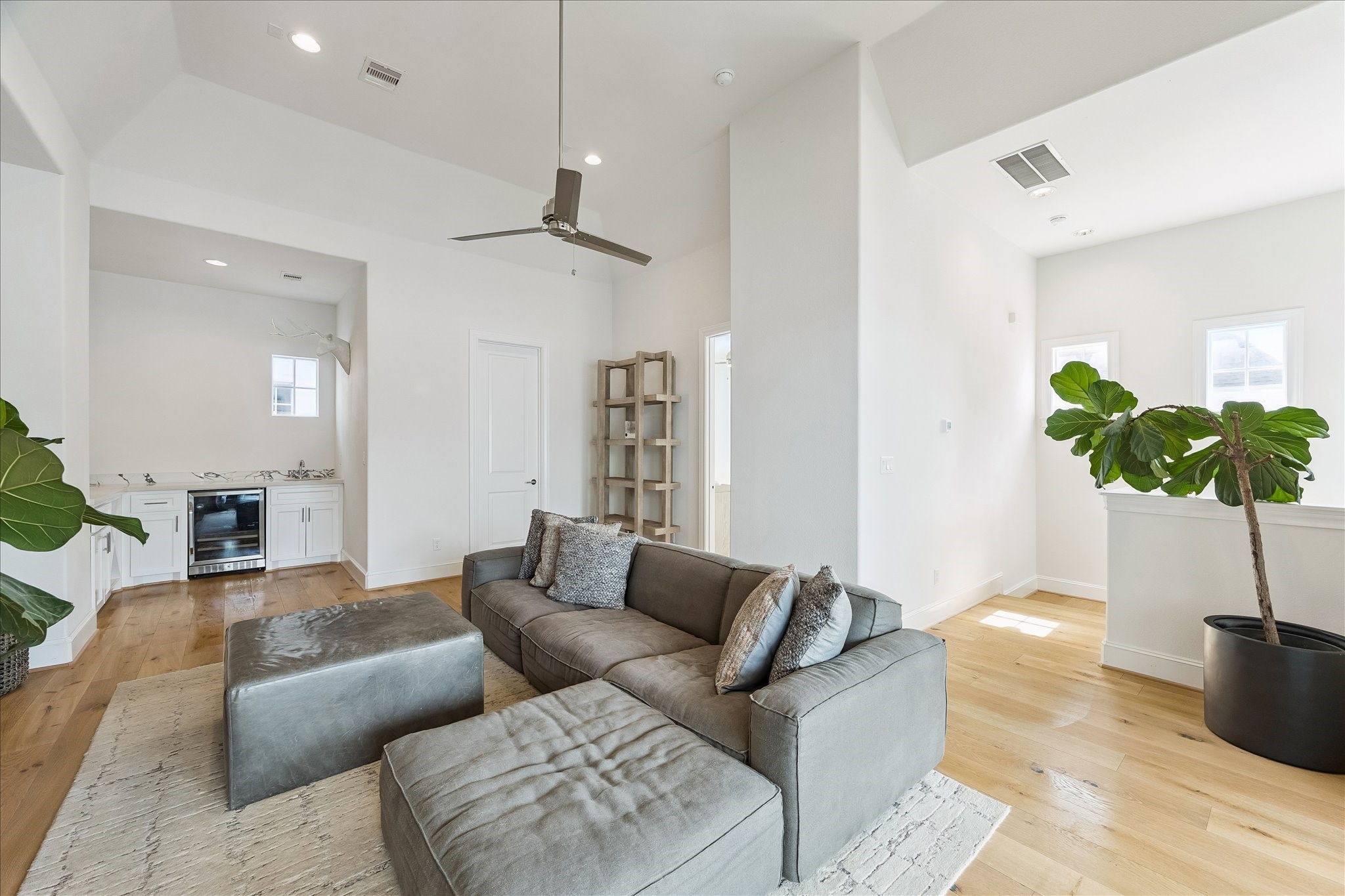 6108 Nicholas Grove Place Houston, TX 77055 - Photo 17 of 29 The delights continue on the third floor, where a spacious game room with vaulted ceilings creates an inviting space to gather. A wet bar in the corner makes entertaining effortless.