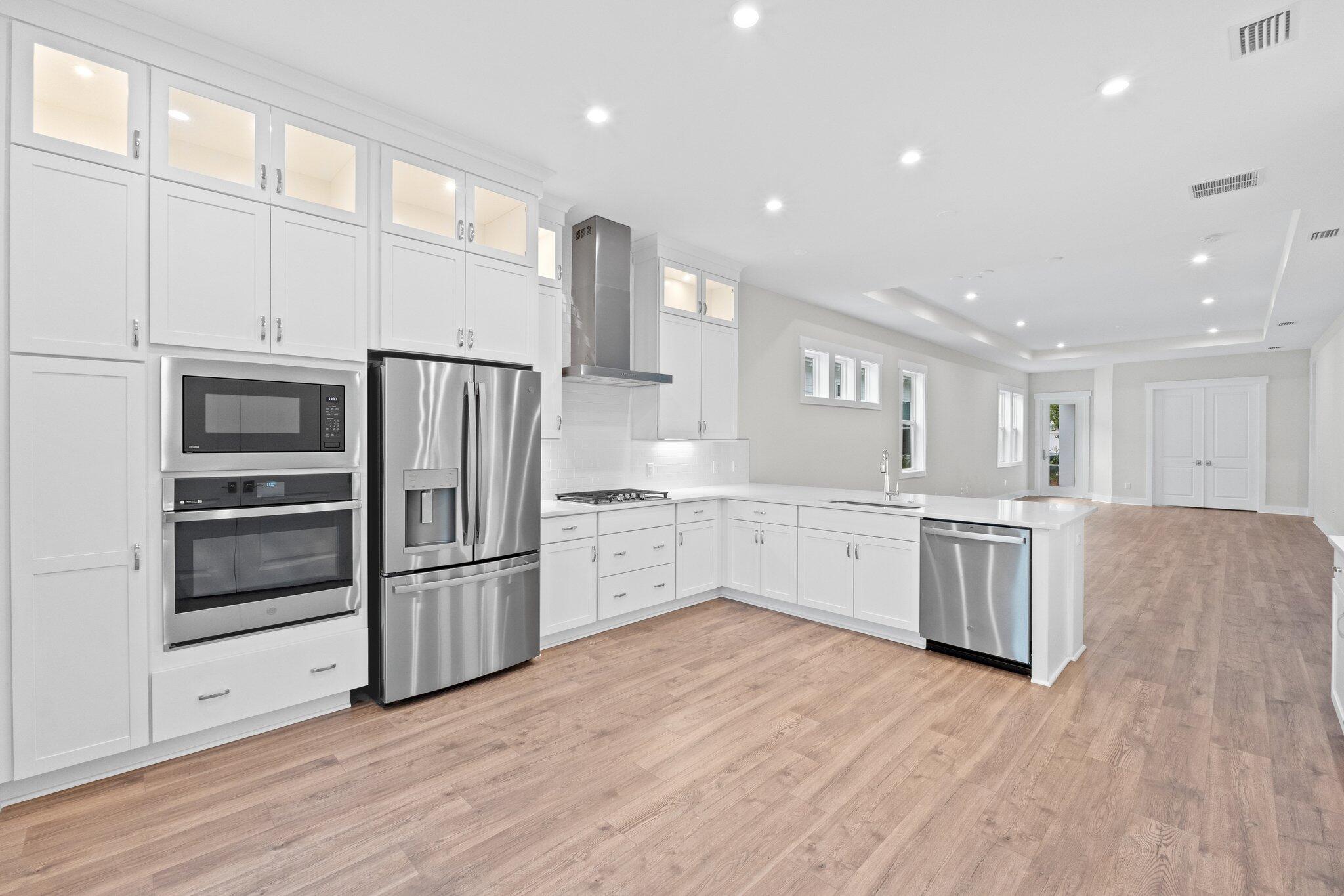16 Ravine Rd Inlet Beach Inlet Beach, FL 32461 - Photo 11 of 31 a kitchen with a refrigerator and a sink