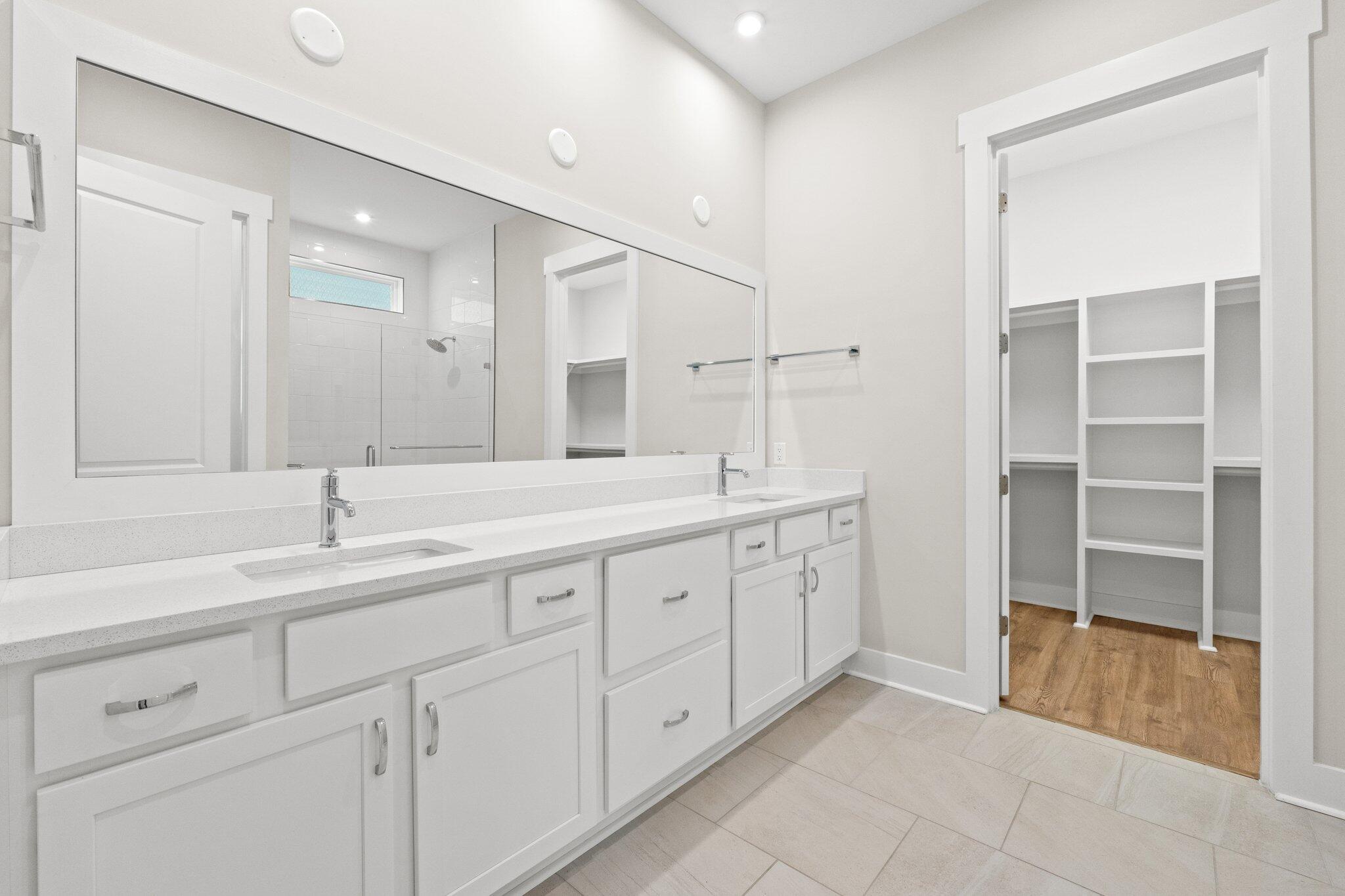 16 Ravine Rd Inlet Beach Inlet Beach, FL 32461 - Photo 16 of 31 a bathroom with double sink and a large mirror