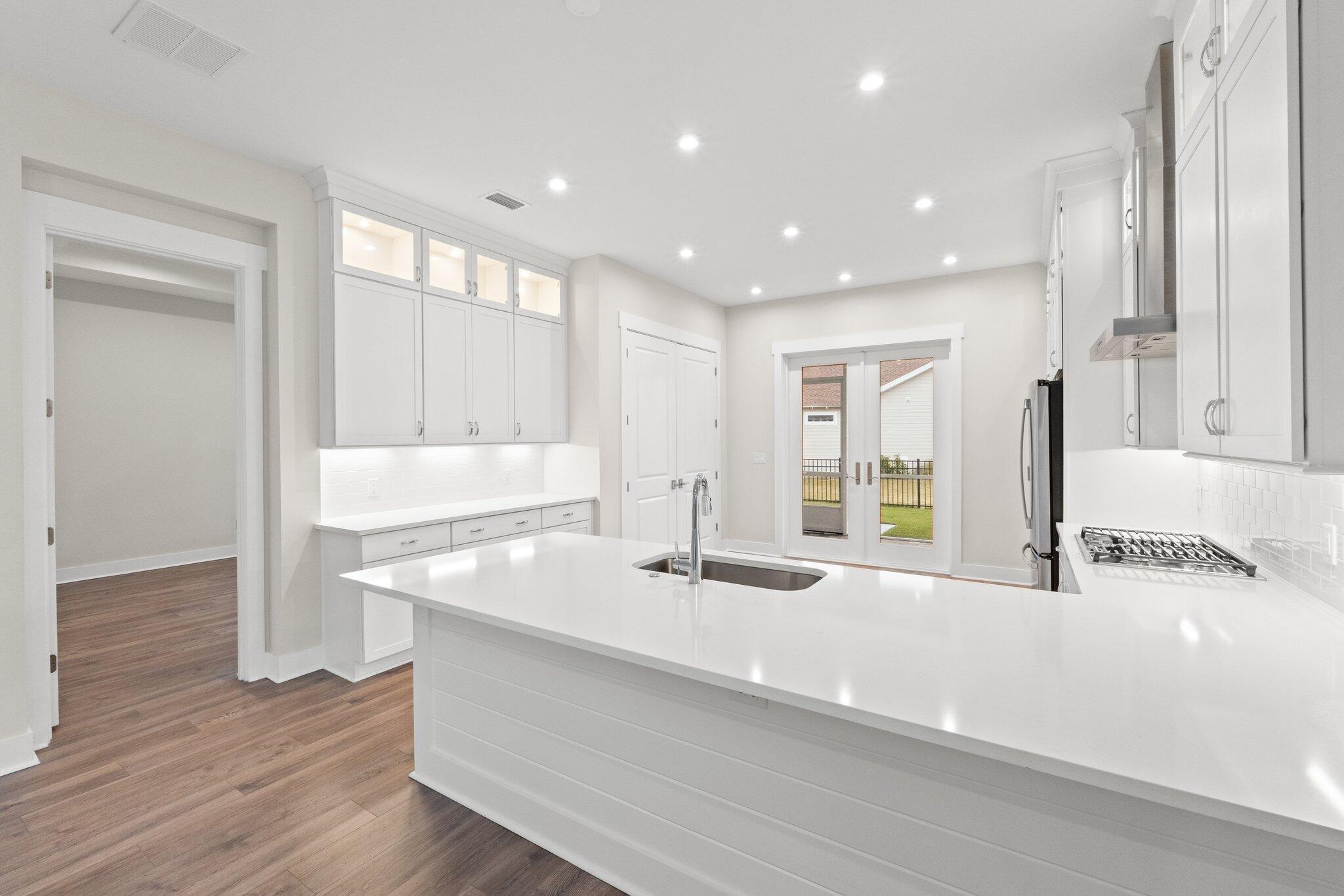 16 Ravine Rd Inlet Beach Inlet Beach, FL 32461 - Photo 19 of 31 a view of kitchen with wooden floor