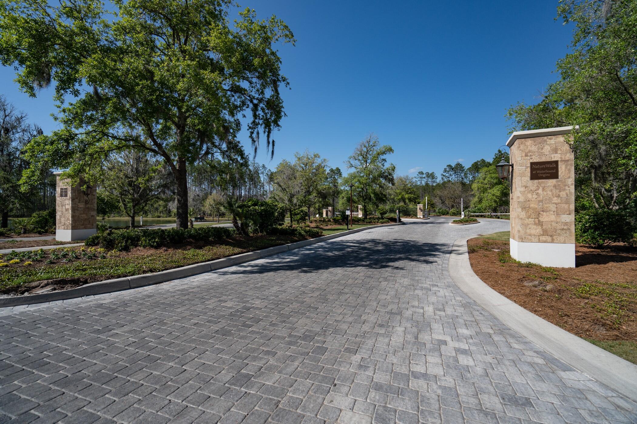 16 Ravine Rd Inlet Beach Inlet Beach, FL 32461 - Photo 25 of 31 a view of a street with a house in the background