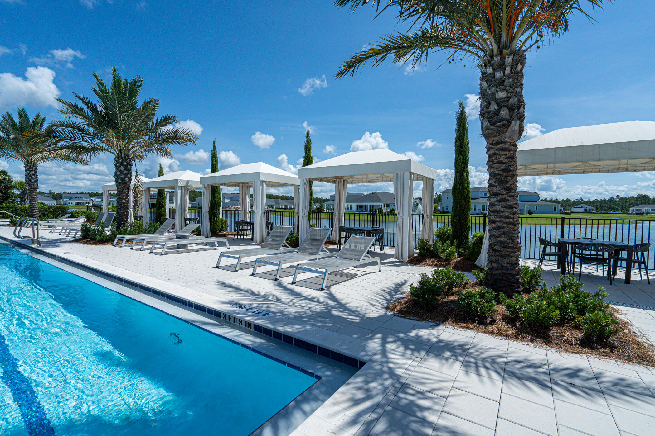 16 Ravine Rd Inlet Beach Inlet Beach, FL 32461 - Photo 27 of 31 a large swimming pool with outdoor seating and yard