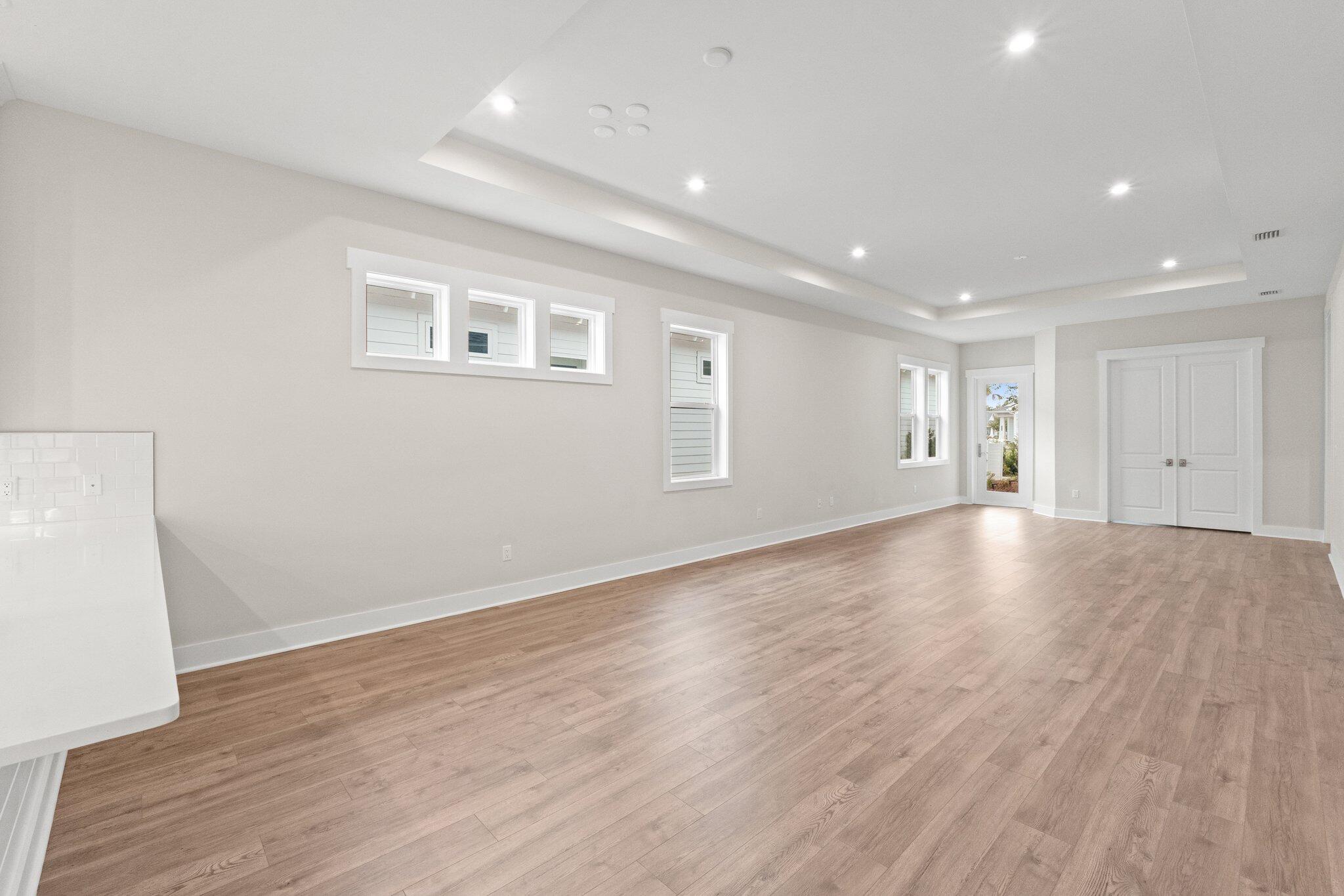 16 Ravine Rd Inlet Beach Inlet Beach, FL 32461 - Photo 3 of 31 a view of empty room with wooden floor and fan