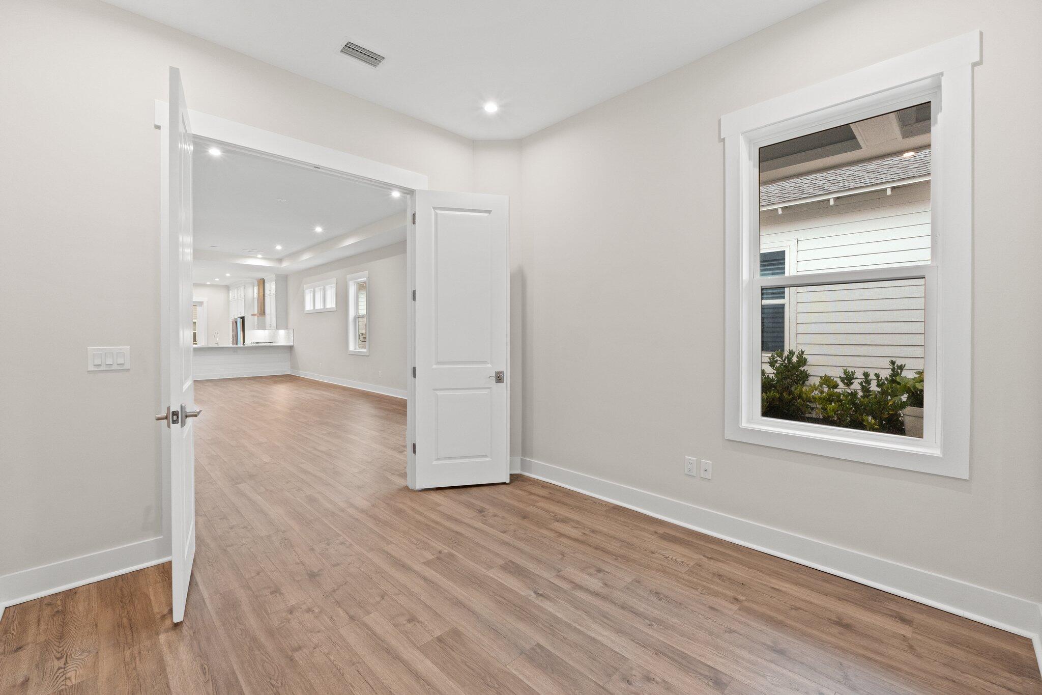 16 Ravine Rd Inlet Beach Inlet Beach, FL 32461 - Photo 4 of 31 a view of a hallway with wooden floor and closet