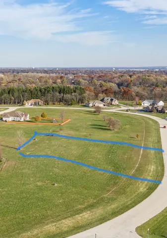 a view of an ocean and houses