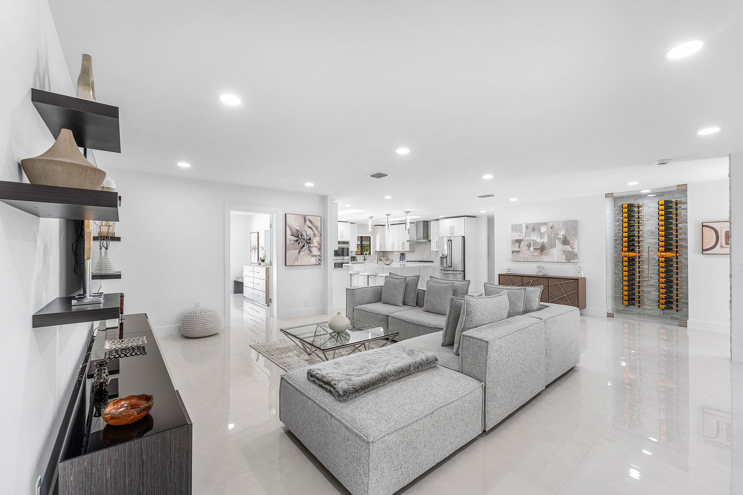 8274 Sawpine Road Delray Beach, FL 33446 - Photo 12 of 63 a living room with furniture and a wooden floor
