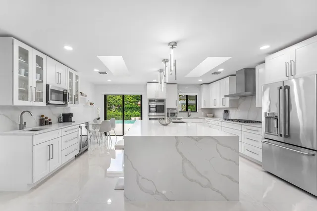 a bathroom with a bathtub and a sink