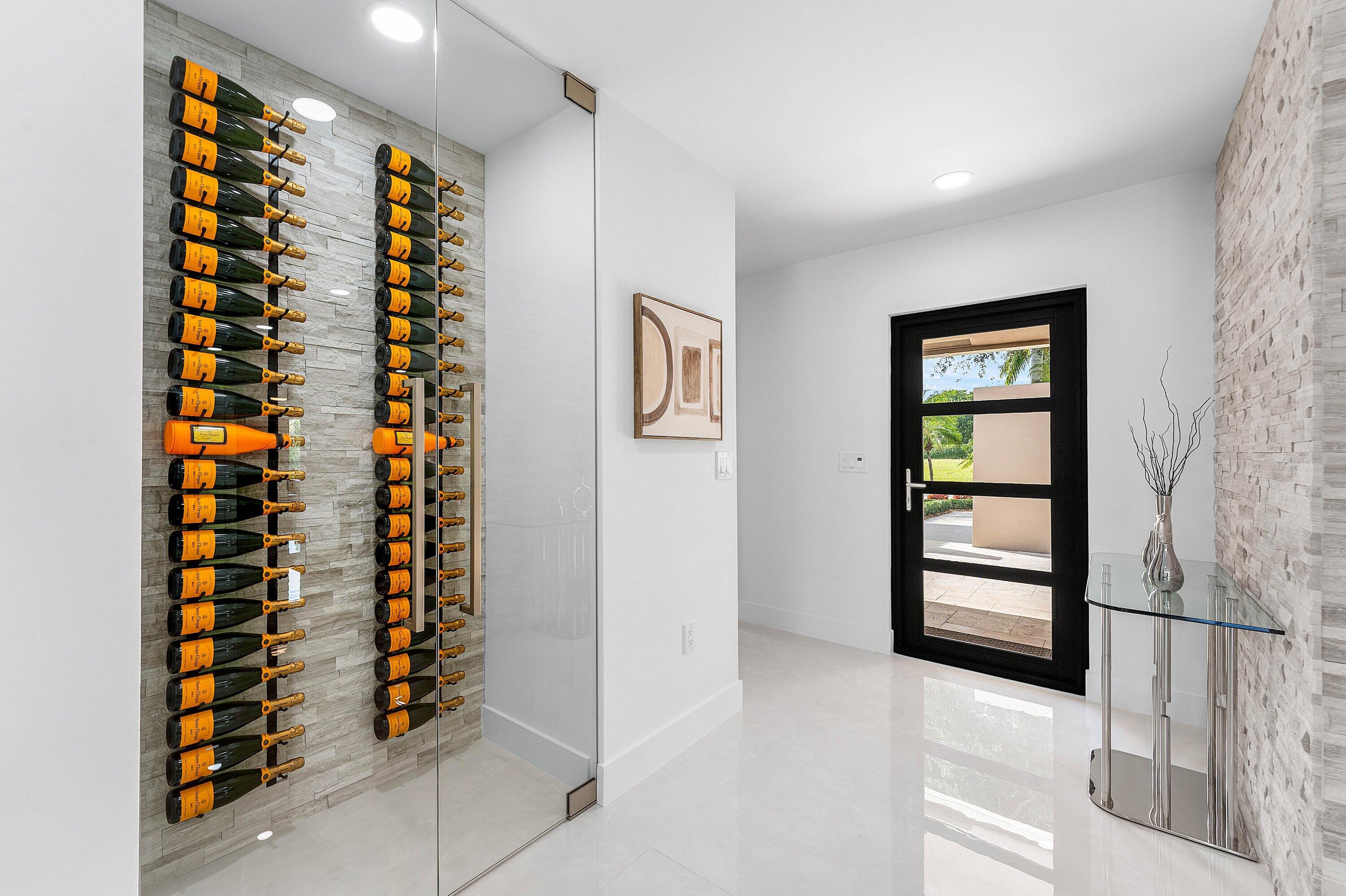 8274 Sawpine Road Delray Beach, FL 33446 - Photo 6 of 63 wooden floor in an empty room with a window