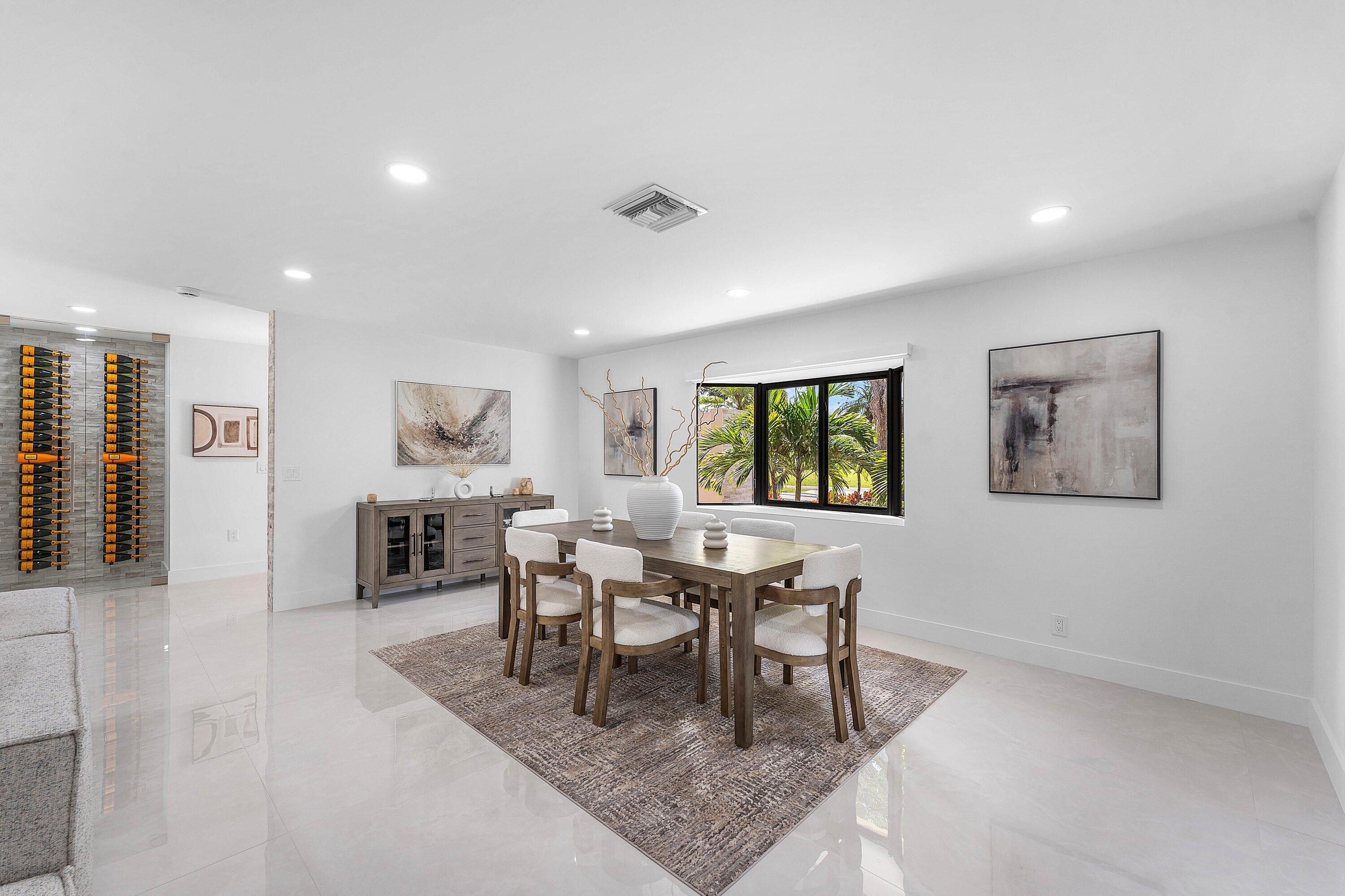 8274 Sawpine Road Delray Beach, FL 33446 - Photo 10 of 63 a dining room with furniture and large window
