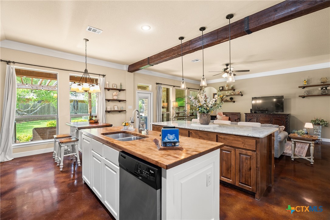 2405 Twin Ridge Court Belton, TX 76513 - Photo 15 of 30 a kitchen that has a lot of cabinets in it