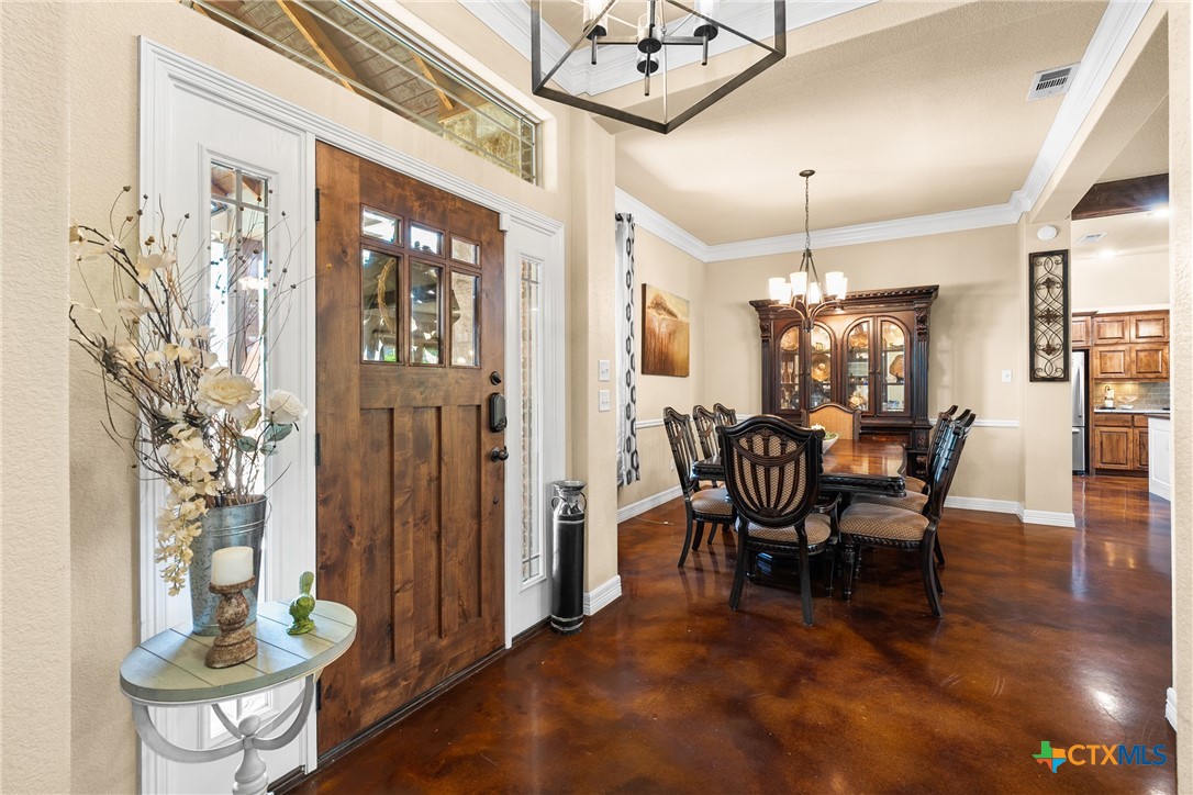 2405 Twin Ridge Court Belton, TX 76513 - Photo 5 of 30 a view of a dining room with furniture window and wooden floor