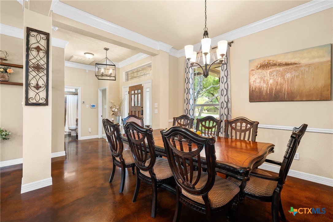 2405 Twin Ridge Court Belton, TX 76513 - Photo 8 of 30 a view of a dining room with furniture window and wooden floor