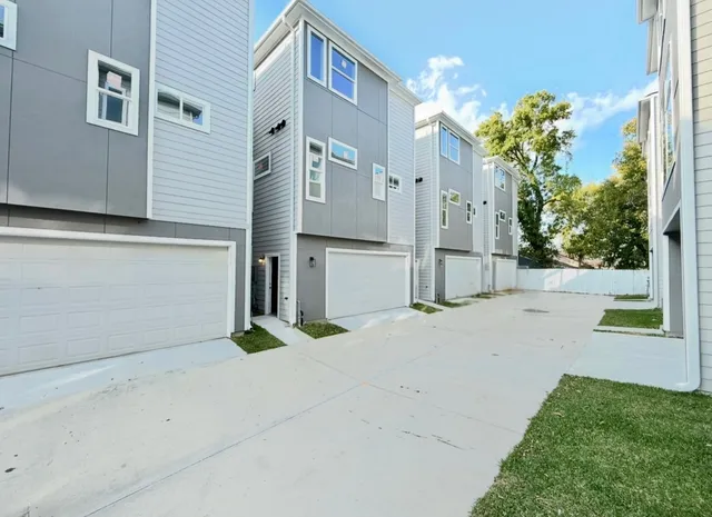 a view of a house with a street
