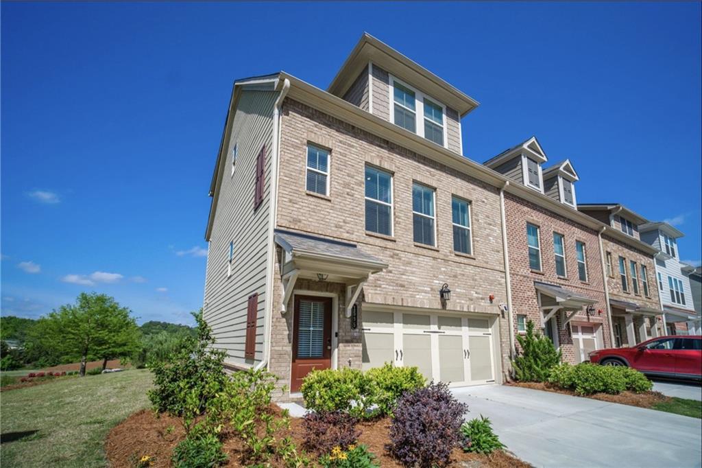 1595 Ridgebrook Downs Mableton, GA 30126 - Photo 1 of 39 a front view of a building
