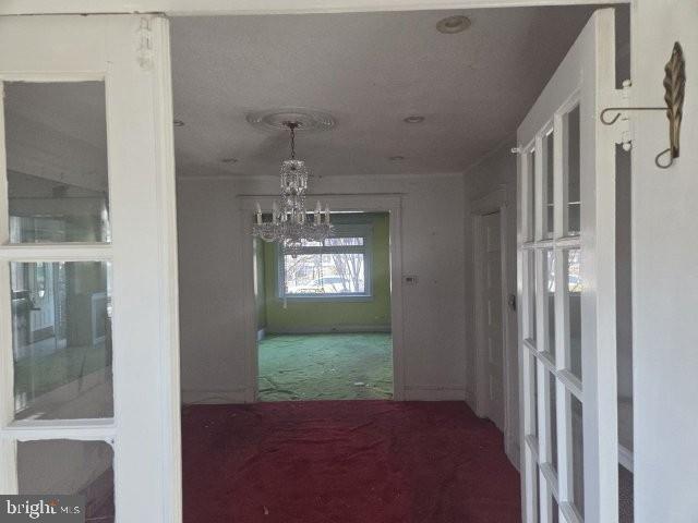 5307 7th Street Northwest Washington, DC 20011 - Photo 11 of 30 a view of a hallway with windows and chandelier