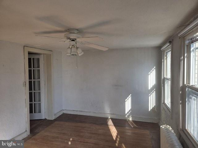 5307 7th Street Northwest Washington, DC 20011 - Photo 16 of 30 wooden floor in an empty room with a window
