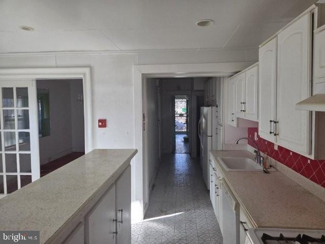 5307 7th Street Northwest Washington, DC 20011 - Photo 10 of 30 a kitchen with sink and refrigerator