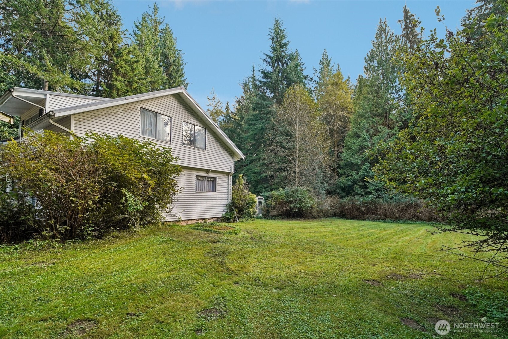 3150 Lily Lake Road Bow, WA 98232 - Photo 11 of 13 a view of a house with backyard and garden