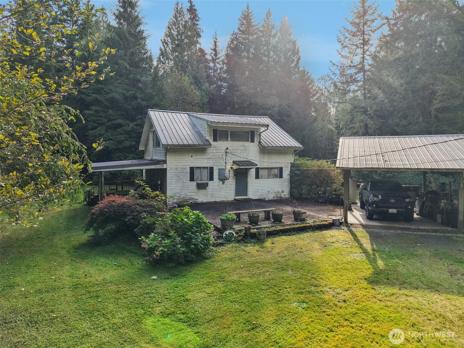 3150 Lily Lake Road Bow, WA 98232 - Photo 12 of 13 a front view of house with yard and swimming pool