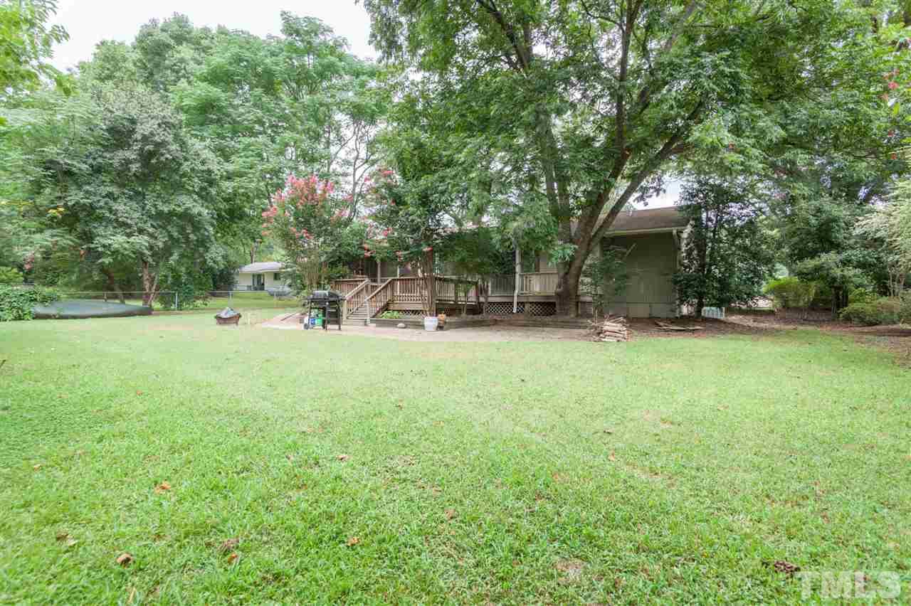 919 Grovemont Road Raleigh, NC 27603 - Photo 22 of 24 a view of a park that has a tree in it