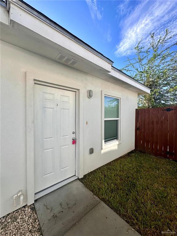 1503 West Heritage Drive, Unit 1 Pharr, TX 78577 - Photo 2 of 17 Entrance to property featuring stucco siding
