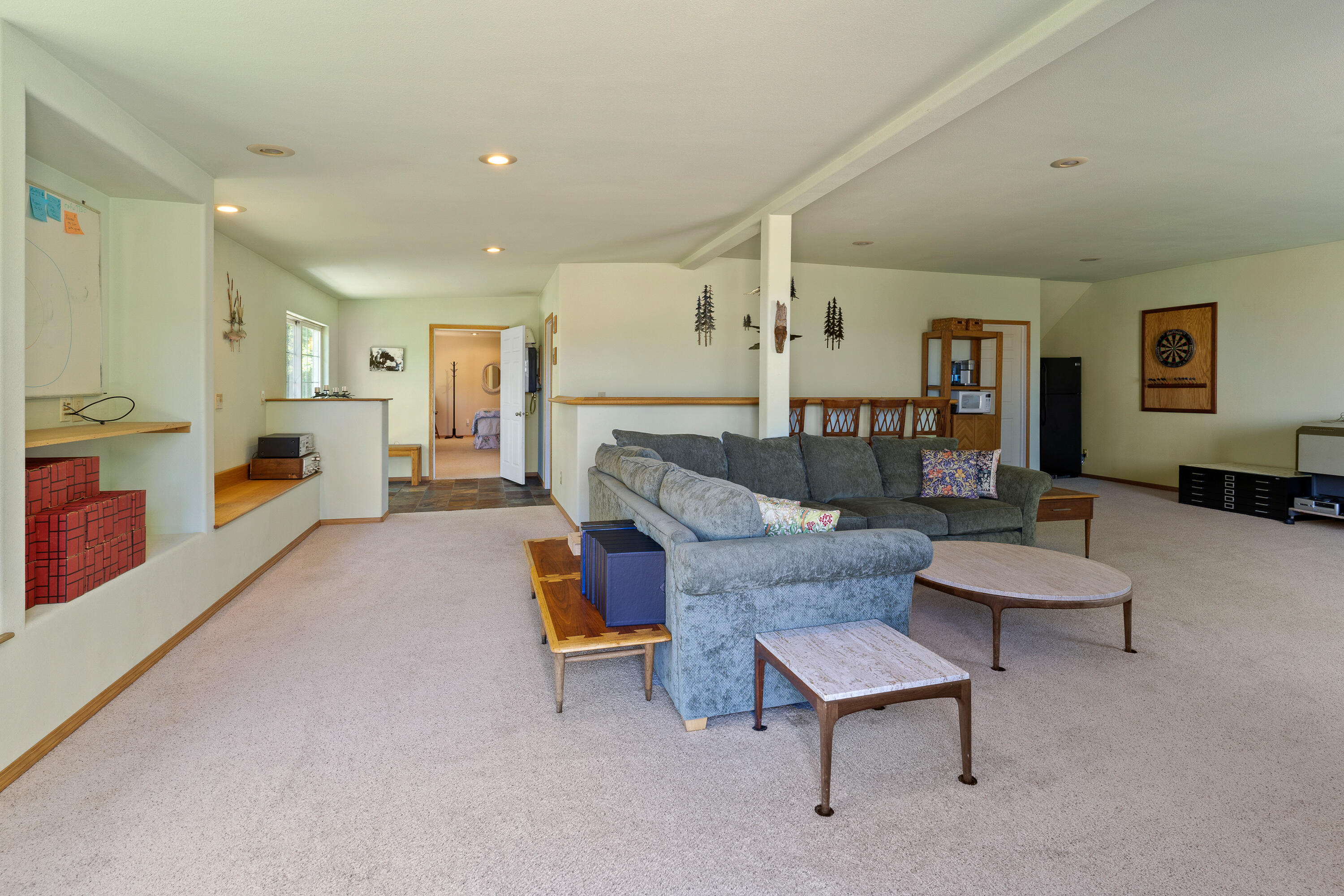 60297 Tekampe Road Bend, OR 97702 - Photo 29 of 33 a living room with furniture and a table