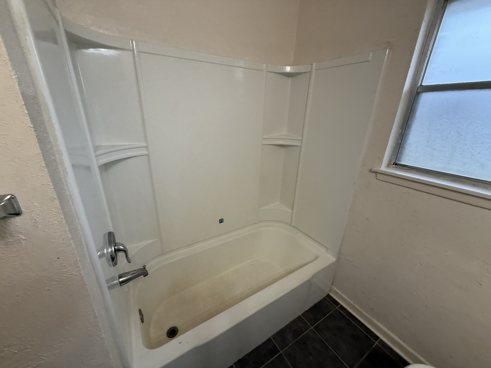 13907 Mueck Road Needville, TX 77461 - Photo 20 of 27 a bathroom with a tub