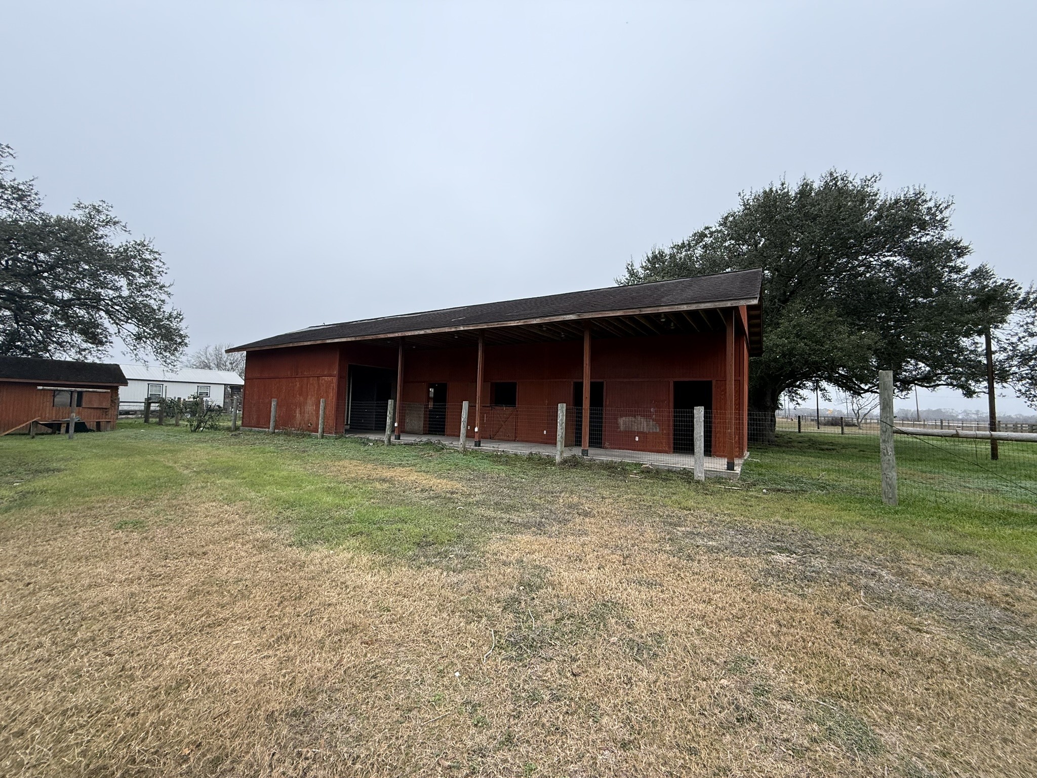 13907 Mueck Road Needville, TX 77461 - Photo 23 of 27 a view of a house with a yard