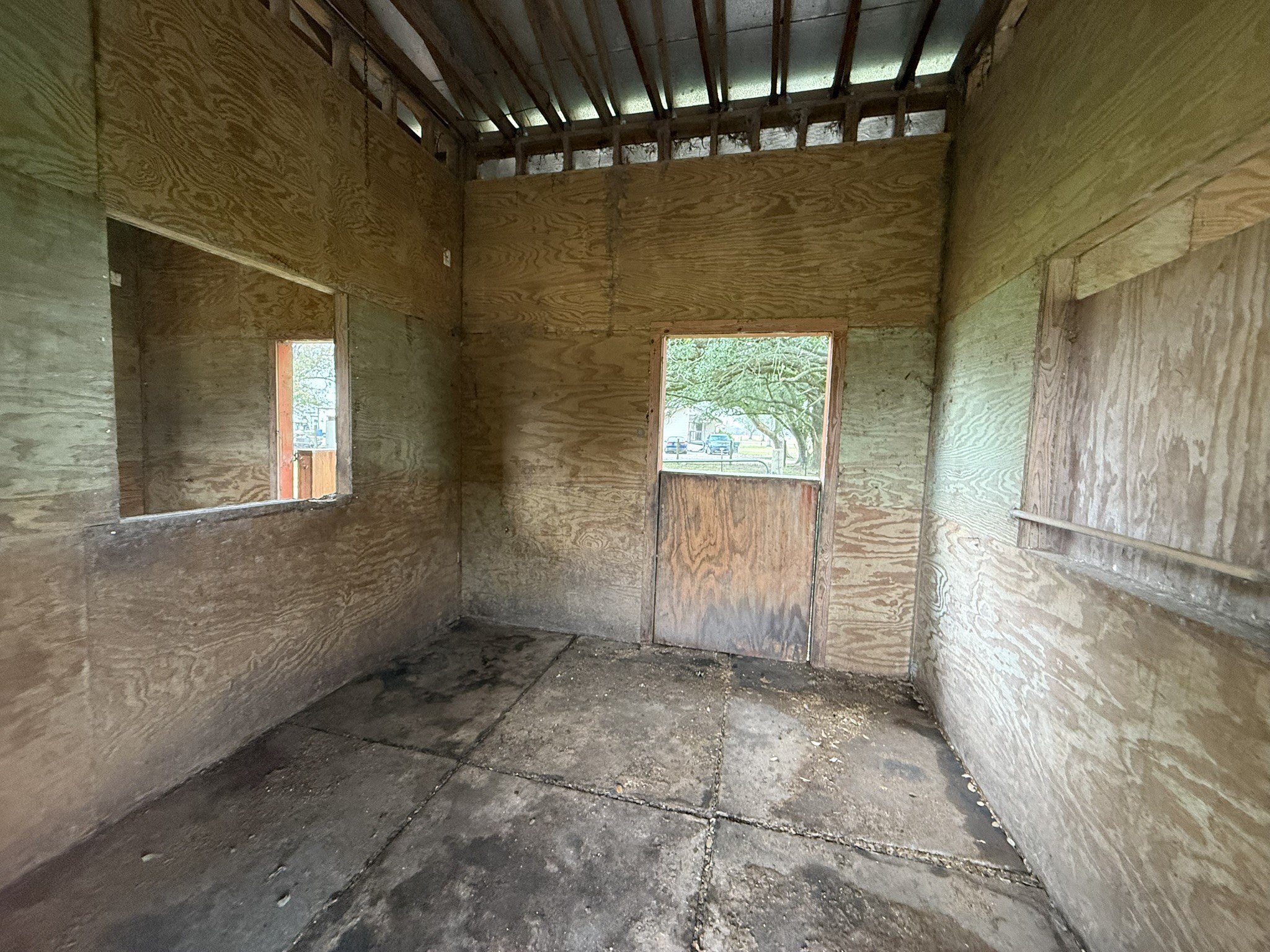 13907 Mueck Road Needville, TX 77461 - Photo 26 of 27 a view of an empty room with windows
