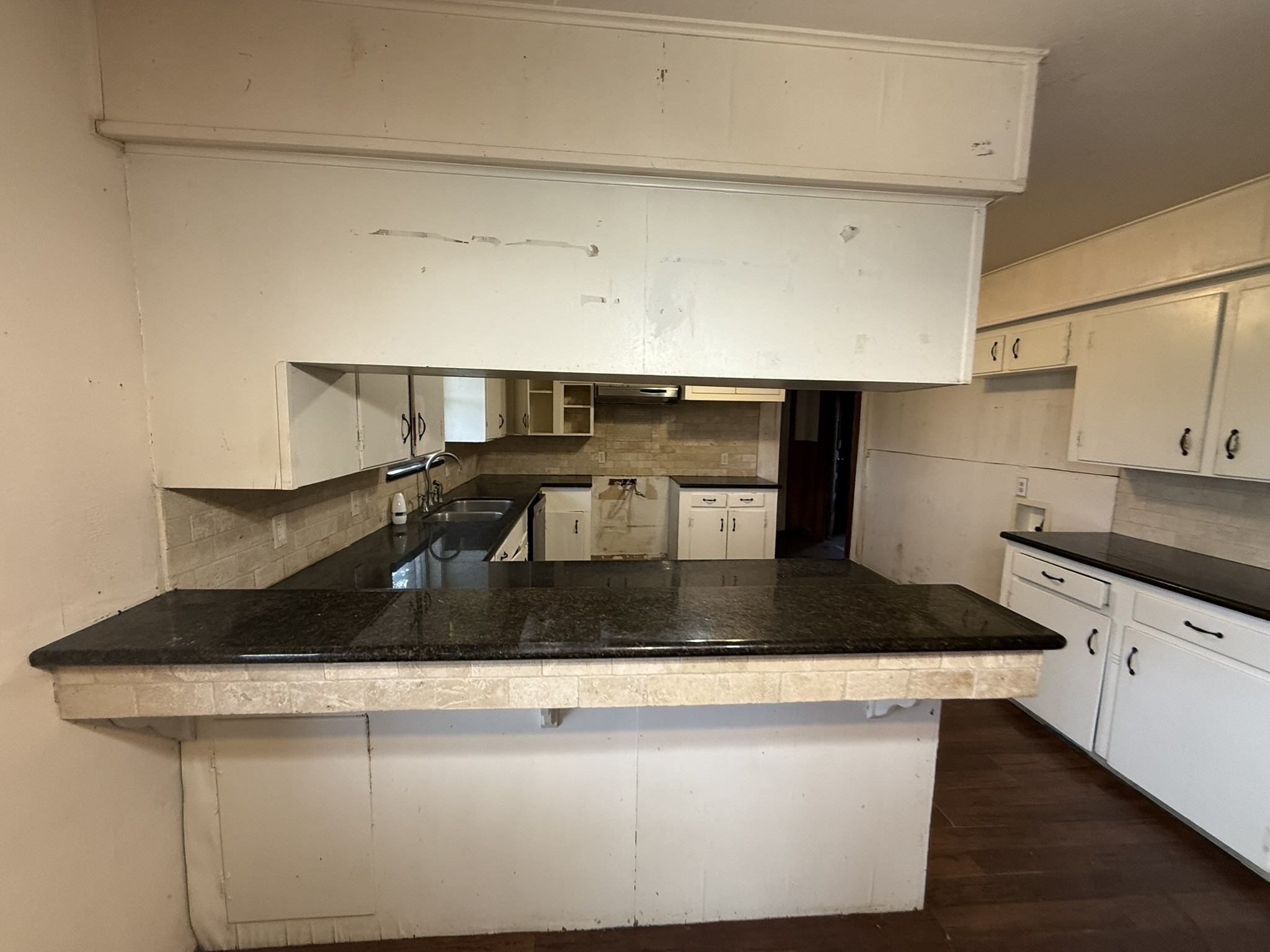 13907 Mueck Road Needville, TX 77461 - Photo 3 of 27 a kitchen with a sink and a stove top oven