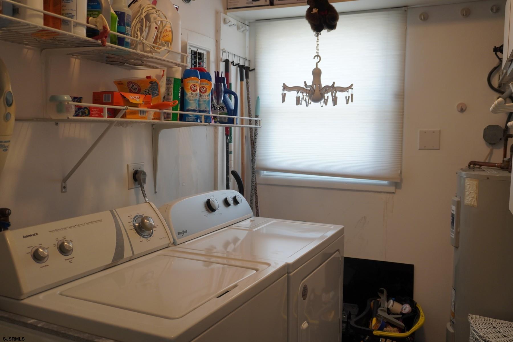 15 South Decatur Avenue, Unit B Margate City, NJ 08402 - Photo 21 of 27 a view of storage and utility room with washer and dryer