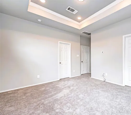 a bathroom with a shower and a sink