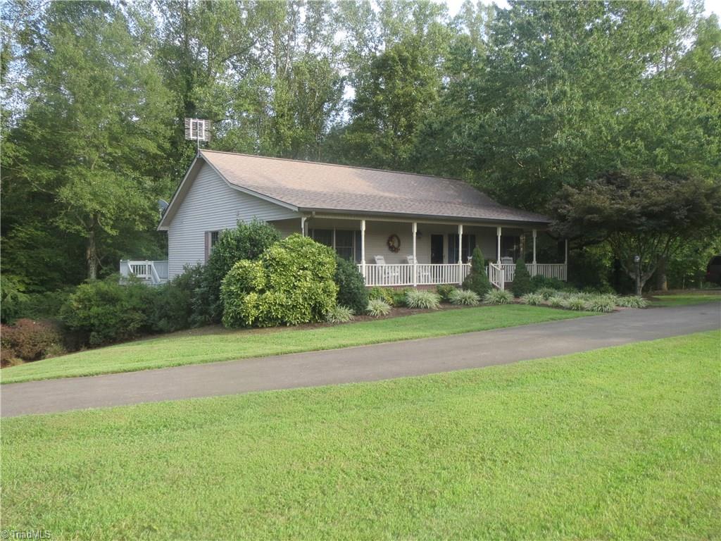 953 Hodges Mill Road Dobson, NC 27017 - Photo 1 of 29 Well-maintained home on 5 acres is conveniently located to I-77, Dobson, Elkin, Mount Airy and major cities.