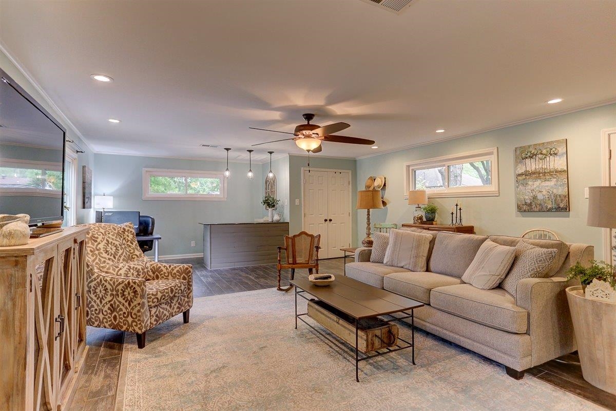 1611 Ivy Road Memphis, TN 38117 - Photo 14 of 29 a living room with furniture and a chandelier