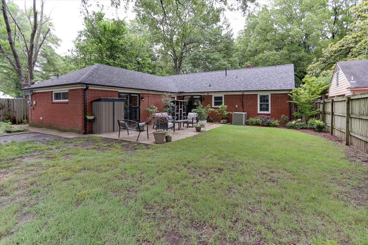 1611 Ivy Road Memphis, TN 38117 - Photo 27 of 29 a view of a house with a yard