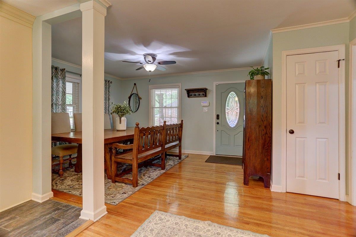 1611 Ivy Road Memphis, TN 38117 - Photo 5 of 29 a view of a room with wooden floor and furniture