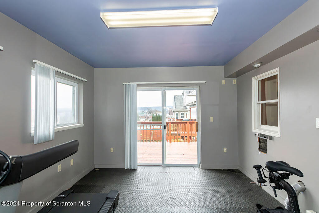 1148 West Locust Street Scranton, PA 18504 - Photo 21 of 40 a view of an empty room and a window