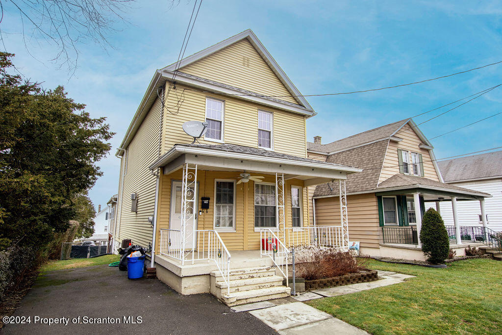1148 West Locust Street Scranton, PA 18504 - Photo 36 of 40 a view of a house with a patio