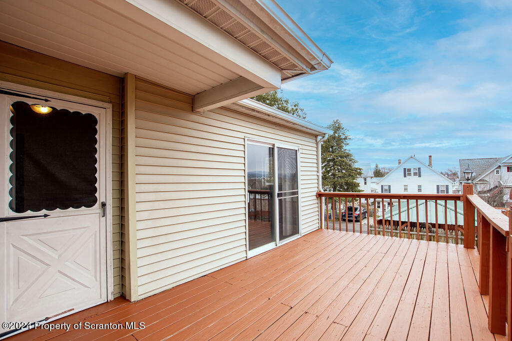 1148 West Locust Street Scranton, PA 18504 - Photo 37 of 40 a view of a balcony with wooden floor