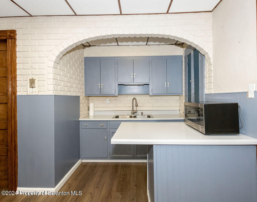 1148 West Locust Street Scranton, PA 18504 - Photo 8 of 40 a kitchen with a sink and a stove top oven