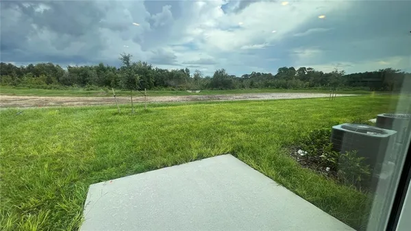 a view of a golf course with a lake