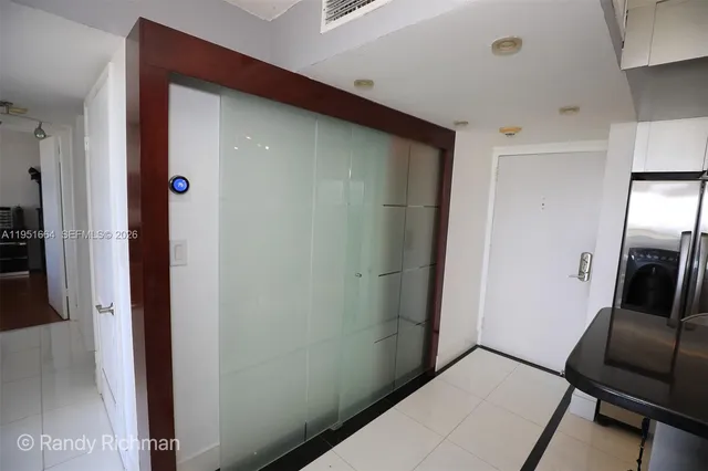 a view of a hallway with elevator
