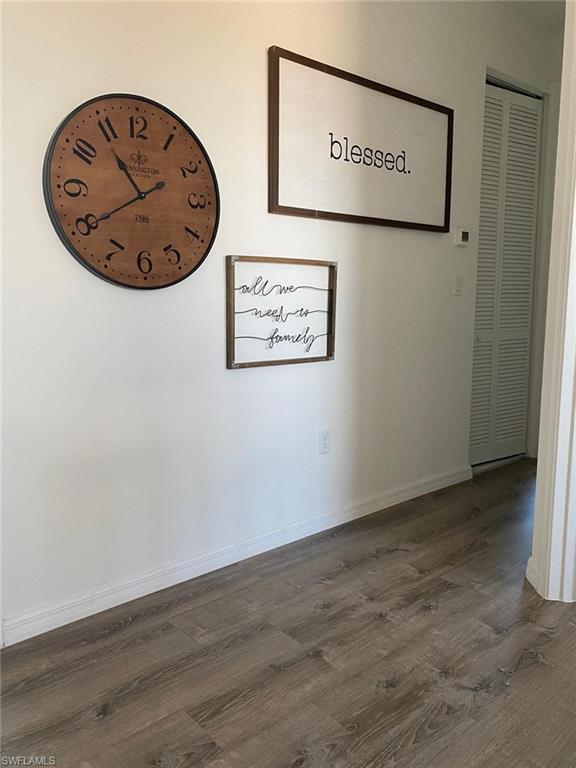 8984 Madrid Circle Naples, FL 34104 - Photo 6 of 15 a view of a hallway with elevator