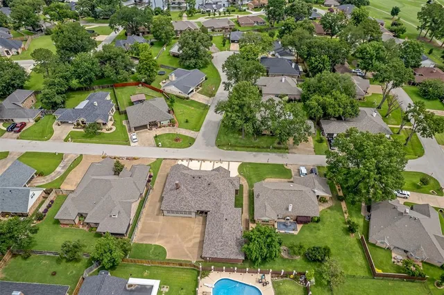 an aerial view of a city with lake view