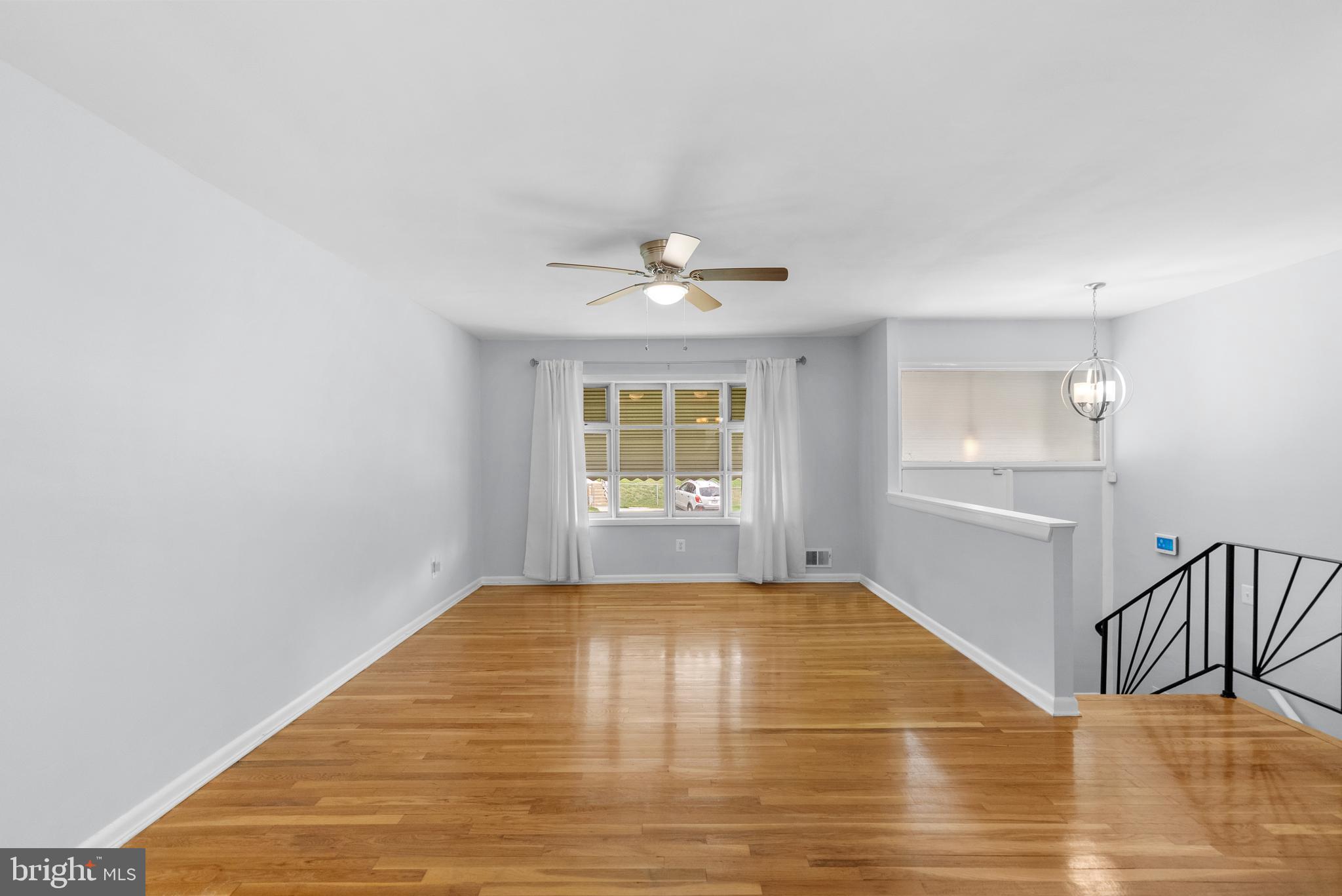 1201 Chillum Manor Road Hyattsville, MD 20783 - Photo 10 of 49 a view of an empty room with a window