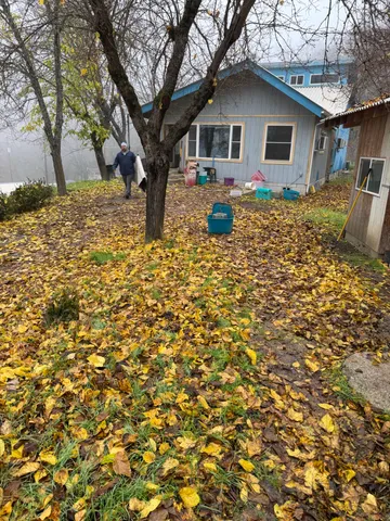 a backyard of a house with seating space