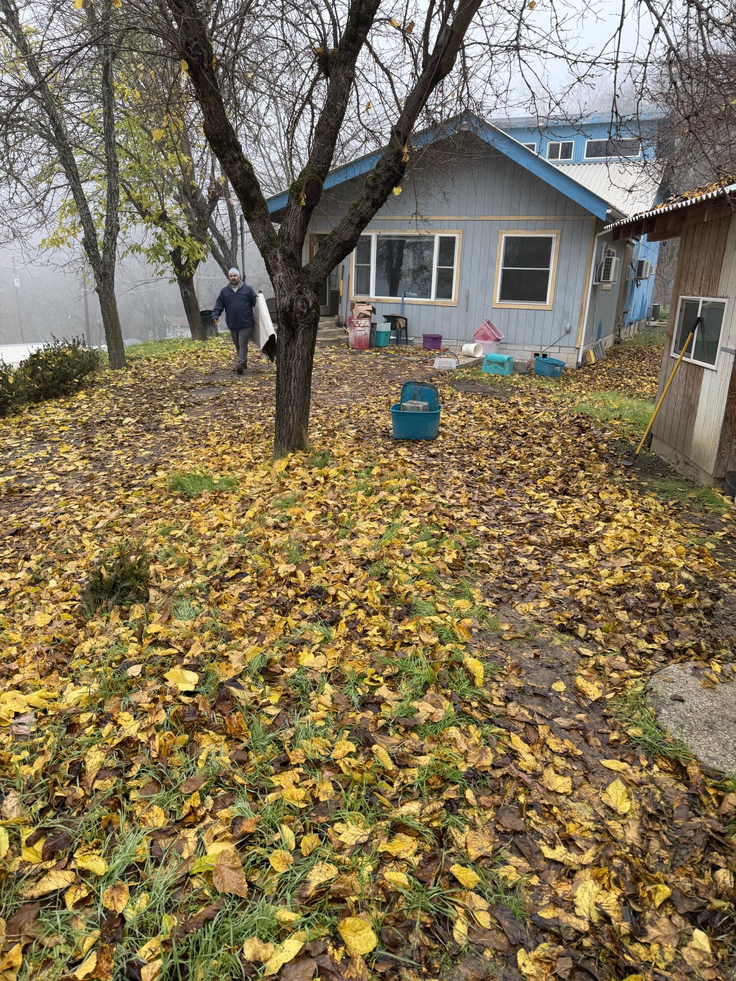 a backyard of a house with seating space