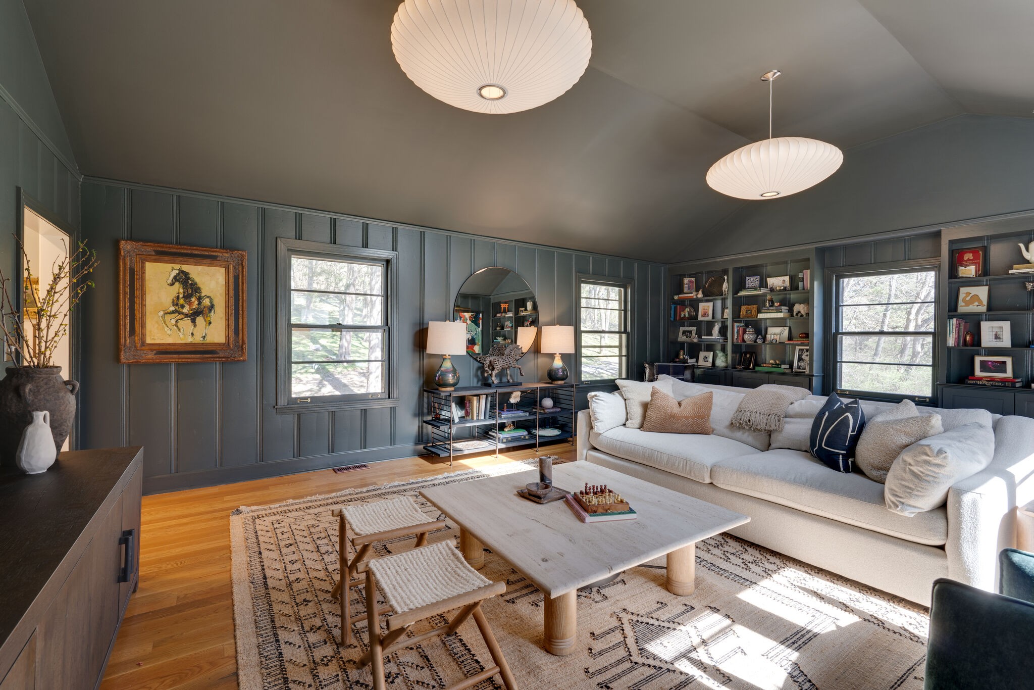 4529 Shys Hill Road Nashville, TN 37215 - Photo 17 of 51 a living room with furniture a chandelier and a large window