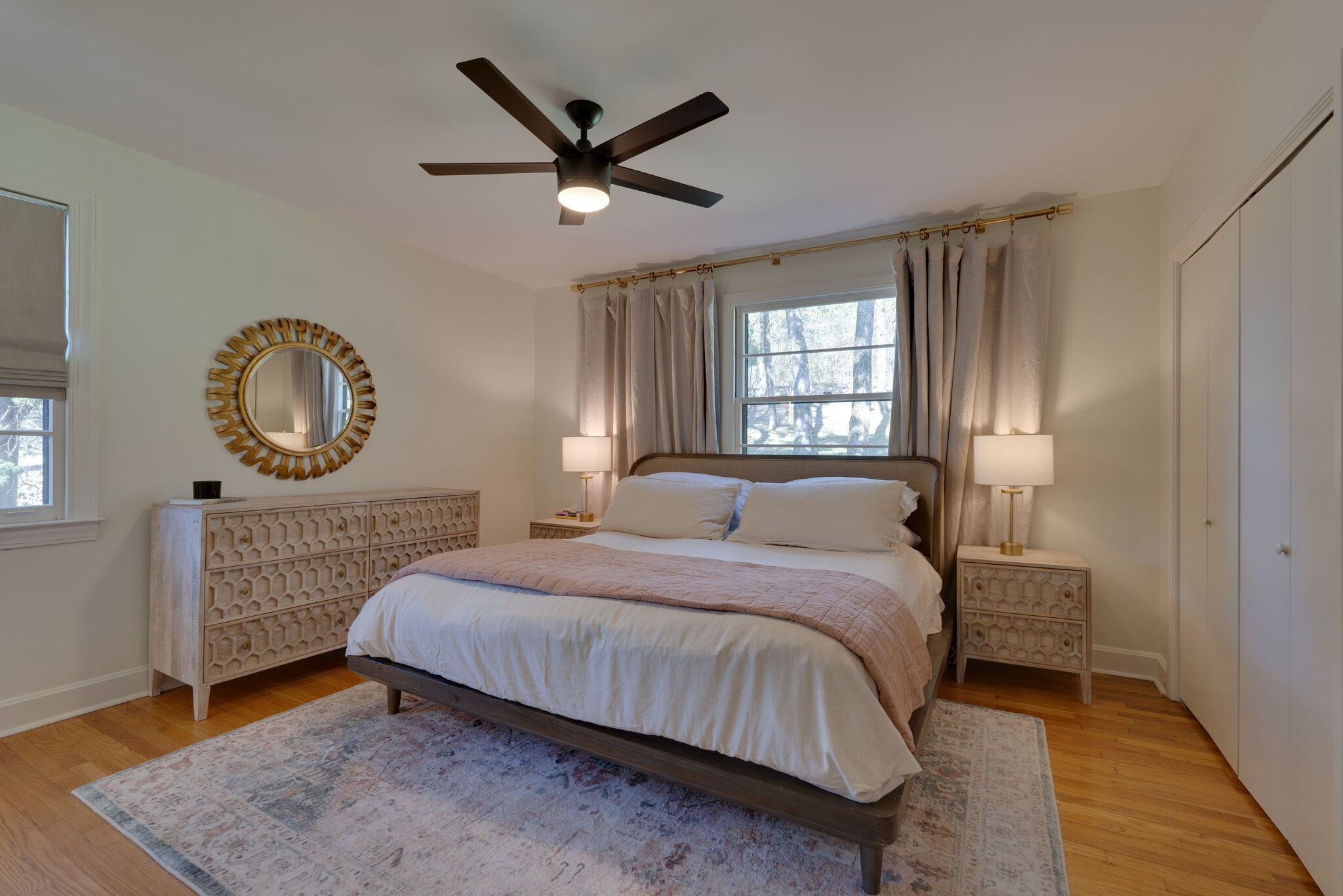 4529 Shys Hill Road Nashville, TN 37215 - Photo 21 of 51 a bedroom with a bed a window and a chandelier