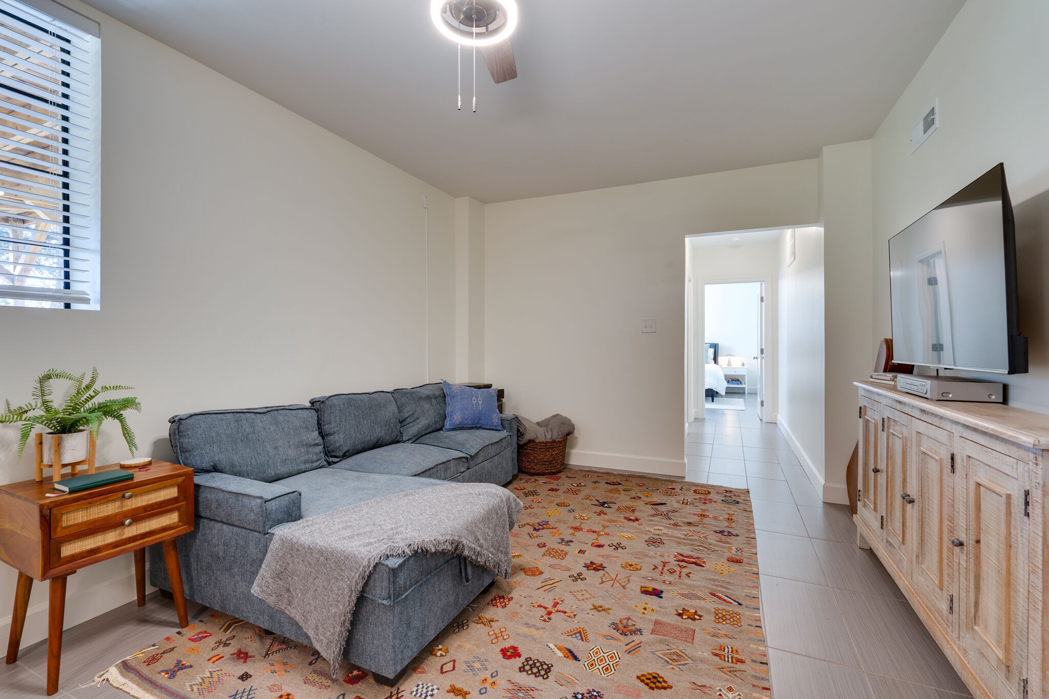 4529 Shys Hill Road Nashville, TN 37215 - Photo 34 of 51 a living room with furniture and a flat screen tv